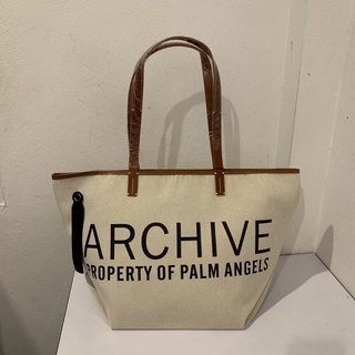 PALM ANGELS ARCHIVE PROPERTY OF PALM ANGELS CANVAS LARGE CABAS TOTE BAG IN OFF WHITE กระเป๋าถือ สะพายไหล่ ปาล์มแองเจิล