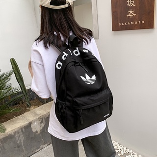 Adidas tide brand schoolbag ชายและหญิงนักศึกษาวิทยาลัยความจุขนาดใหญ่นักเรียนมัธยมศึกษาตอนต้นน้ำแฟชั่นทุกการแข่งขันกระเป๋