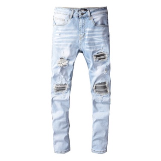 AMIRI blue hole patch micro-elastic amiri jean