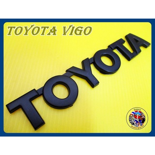 โลโก้ สีดำ - TOYOTA VIGO LOGO BADGE EMBLEM SIZE  ขนาด 15x 2.5 CM.