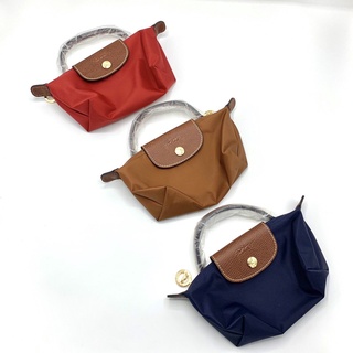 LONGCHAMP MINI LE PLIAGE POUCH WITH HANDLE กระเป๋าถือใบเล็ก แบรนด์ลองชอม ผ้าไนล่อน