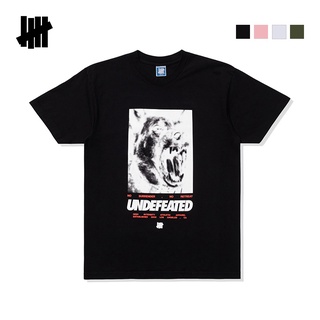 Undefeated เสื้อยืดแขนสั้น ผ้าฝ้าย พิมพ์ลายโลโก้อเมริกัน สําหรับผู้ชาย และผู้หญิงยืด.สบาย.รัก