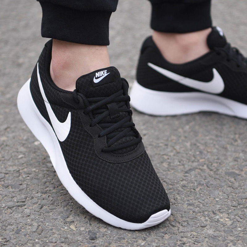 mens black nike tanjun