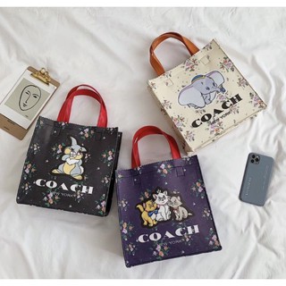 ⚡️สินค้าพร้อมส่ง⚡️กระเป๋าถือ กระเป๋าถือแฟชั่น กระเป๋าช้างดัมโบ้ COACH กระเป๋าแฟชั่นน่ารัก กระเป๋าถือผู้หญิงรุ่นหนัง