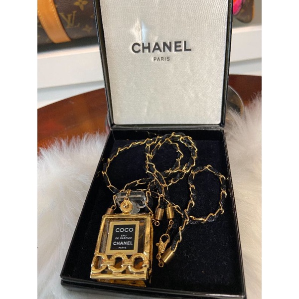 chanel necklace perfume botel