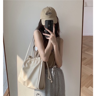 🧋 กระเป๋าหนังหูรูดทรงเหลี่ยม Tierra bag 🍼 ใส่ของได้เยอะ หนังทนทาน เรียบง่ายใช้งานได้ทุกวัน