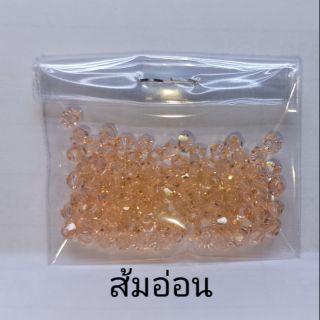 คริสตัลสวารอฟสกี้ (SWAROVSKI) 
สีน้ำส้มอ่อน ขนาด 3mm