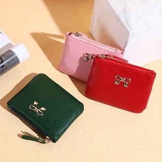 กระเป๋าใส่เหรียญประดับโบว์สีทองหน้า มีช่องหลัง กระเป๋าหนังแท้ใบเล็กใส่ทรงสี่เหลี่ยม😊⭐