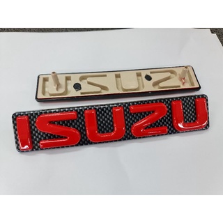 โลโก้หน้ากระจัง ISUZU สีแดงพื้นเคปล่า ของรุ่น DMAX 07 -11