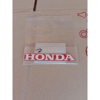 สติ๊กเกอร์แท้ HONDA สีขาวพื้นแดง ติดบังลมเวฟ125รุ่นไฟเลี้ยวบังลม,1ชิ้น(87130-KTM-730ZG)