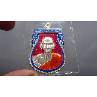 เหรียญหลวงพ่อพัฒน์ รุ่นมนต์พระกาฬ 99 (เงินแถมยกลัง)เนื้อเงิน ลงยาแดง ขอบน้ำเงิน หลวงพ่อพัฒน์ โคท 28