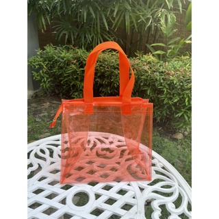 กระเป๋าใส PVC ใส่ของ สีส้ม ขนาด 25*21*15 cm.