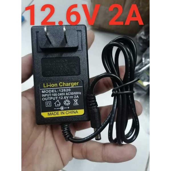อแดปเตอร์ชาร์จ 12.6v 2a ป้ายเหลือง มีไฟสถานะแดงชาร์จ เขียวเต็ม