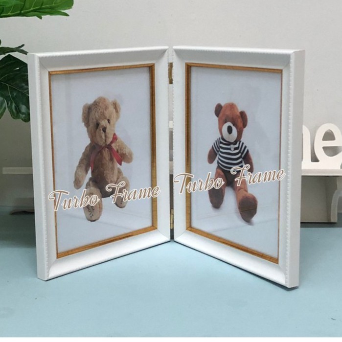 กรอบรูปคู่บานพับ TURBO FRAME ผลิตและจำหน่ายกรอบรูปคู่บานพับ ขนาดภาพ 4x6"คู่ ,5x7"คู่ ,6x8"คู่ ,8x10"คู่,8x12" คู่,A4คู่