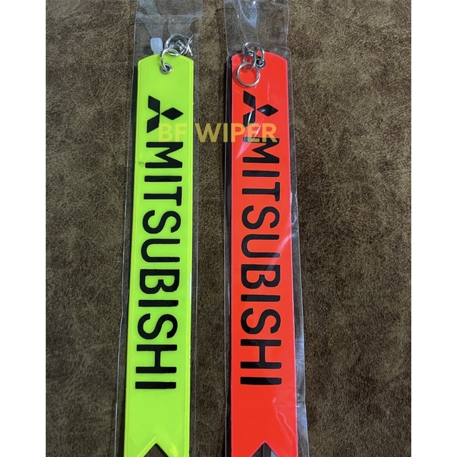 ป้ายห้อยท้ายรถยนต์/ริบบิ้นห้อยท้ายรถยนต์ แบบยาว สีสะท้อนแสง  1 ชิ้น มี2สี  MITSUBISHI