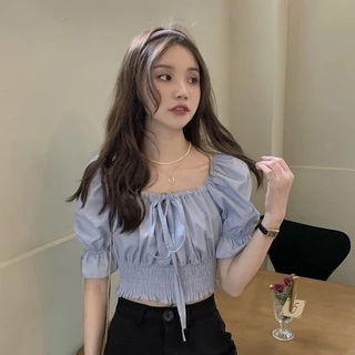 มาใหม่เสื้อครอปเอวลอยเเขนตุ๊กตาผูกโบว์ สีพื้นผ้าลื่น งานสม็อคเอว มี3สีไห้เลือก