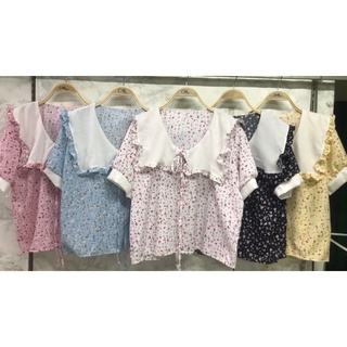 เสื้อแฟชั่นดอกแต่งปกขาวระบาย