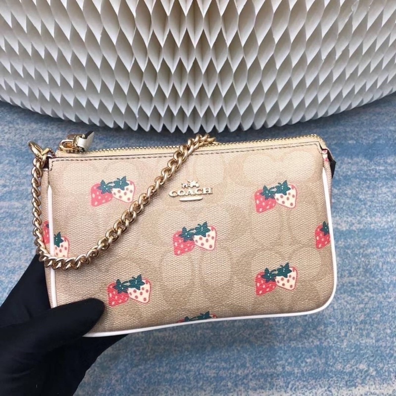 COACH POUCH IN SIGNATURE CANVAS WITH STRAWBERRY