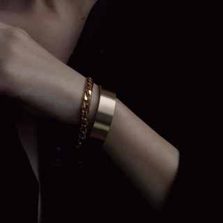 Herse.ac gold bangle