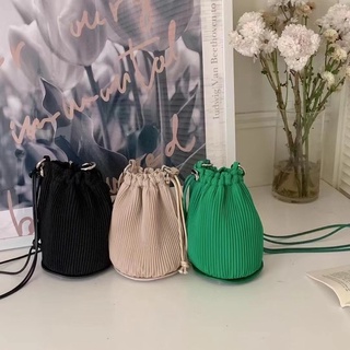 Mini bucket pleat crossbody bag กระเป๋าทรงขนมจีบ ผ้าพลีท by MAMIL