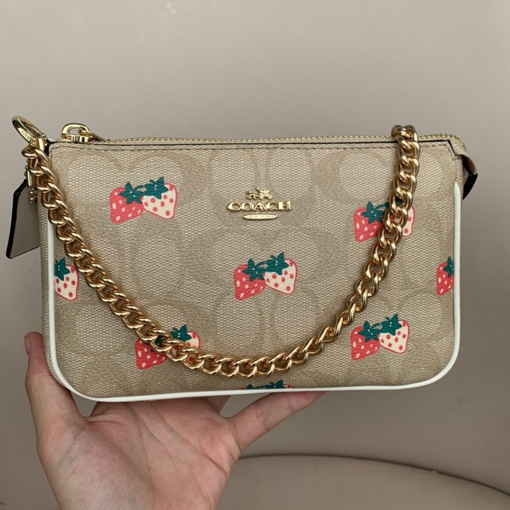 strawberry coach purse