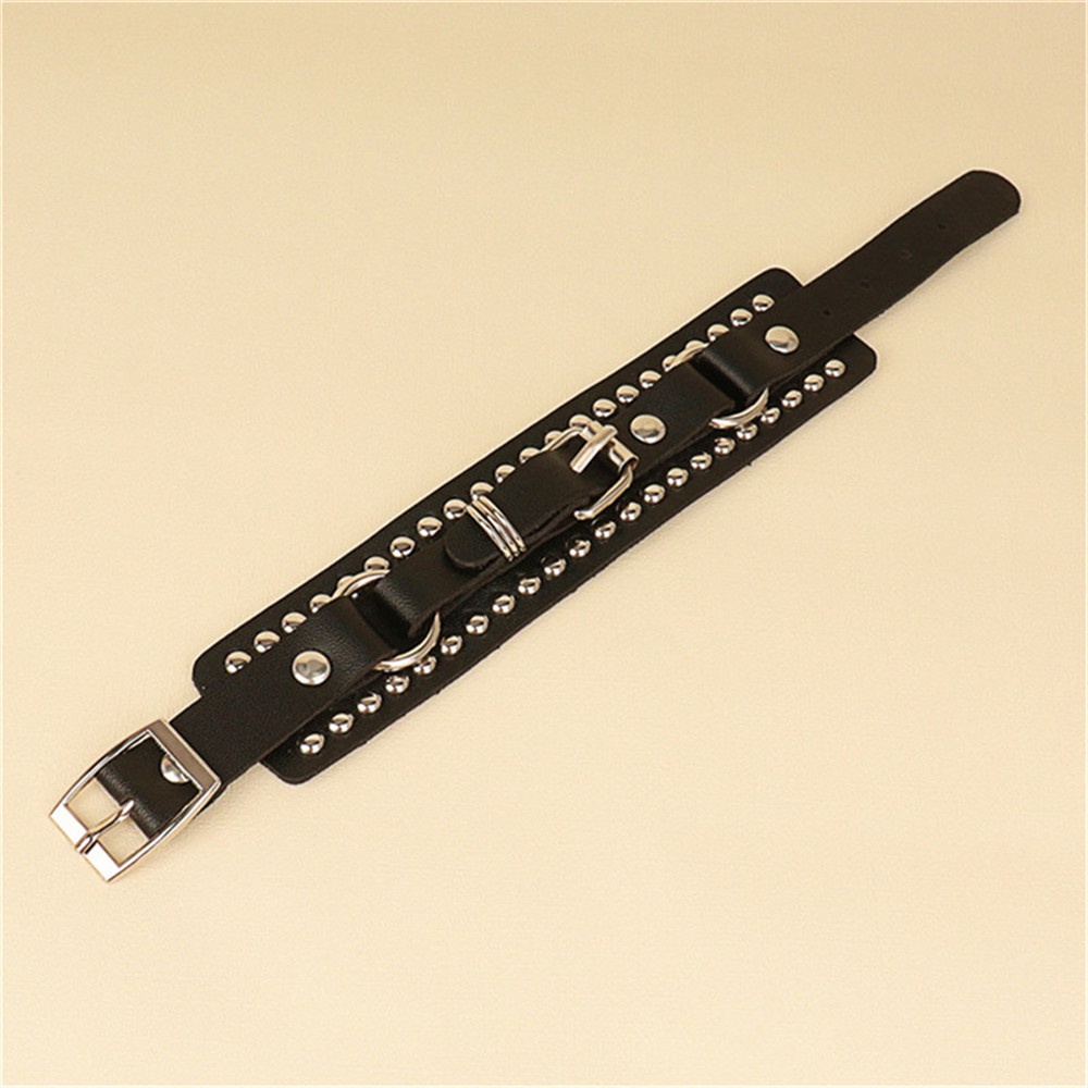 ใหม่ สร้อยข้อมือหนัง PU สร้อยข้อมือพังก์ ปรับได้ กอธิค กําไลข้อมือ โกธิค หมุดย้ํา หัวเข็มขัด สายรัดข้อมือ สําหรับผู้ชาย ผู้หญิง - รูปที่ 2
