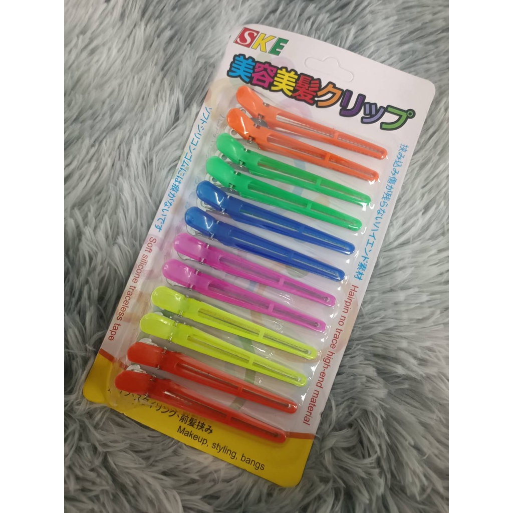 กิ๊บปากเป็ดสีสด 6 สี แพ็ค 12 ชิ้น กิ๊บปากเป็ดใช้สำหรับหนีบ หรือยึด เพื่อแบ่งผมไว้ในระหว่างการทำผม