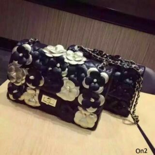 Chanel black camellia flap bag