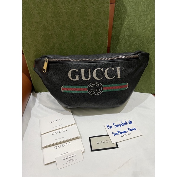 Gucci print leather belt bag