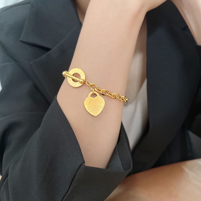 สร้อยข้อมือเสน่ห์หัวใจรักเหล็กไทเทเนียมสร้อยข้อมือหลายเสน่ห์ot