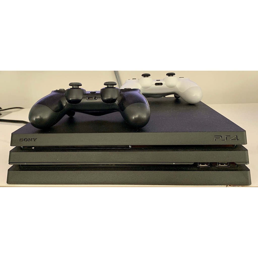 PlayStation PS4 Pro 4K 1TD (Used) แถมเกมส์ 7 กล่อง มีจอยสติ๊ก 2 อัน มือสองสภาพดีมาก with 2 joy stick