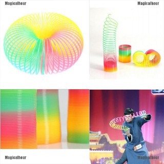 1 ชิ้น Slinky พลาสติกสีรุ้งของเล่นสำหรับเด็ก