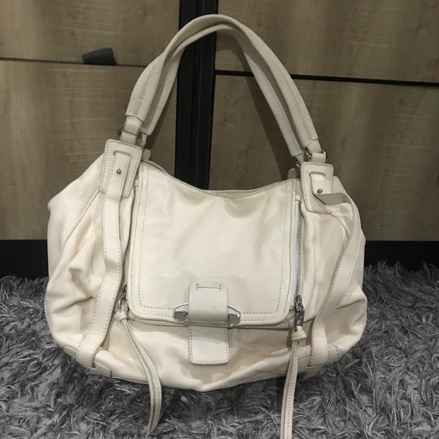 กระเป๋าหนังสีขาวครีมkooba แท้