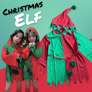 Christmas Elf มาเป็นเสื้อสวมตัวยาว มีฮู้ดปลายแหลม ติดพู่ พร้อมเชือกปอมๆ รัดเอว