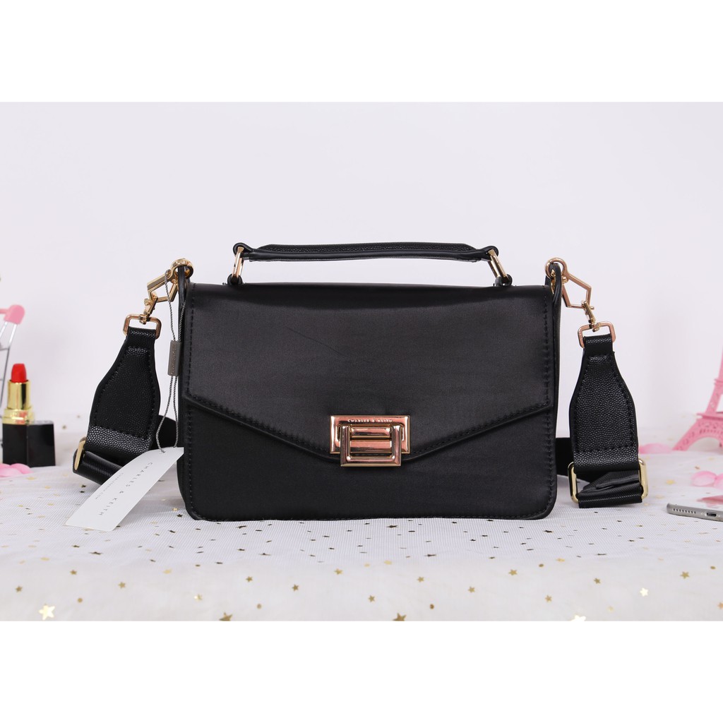 boxy push lock crossbody bag