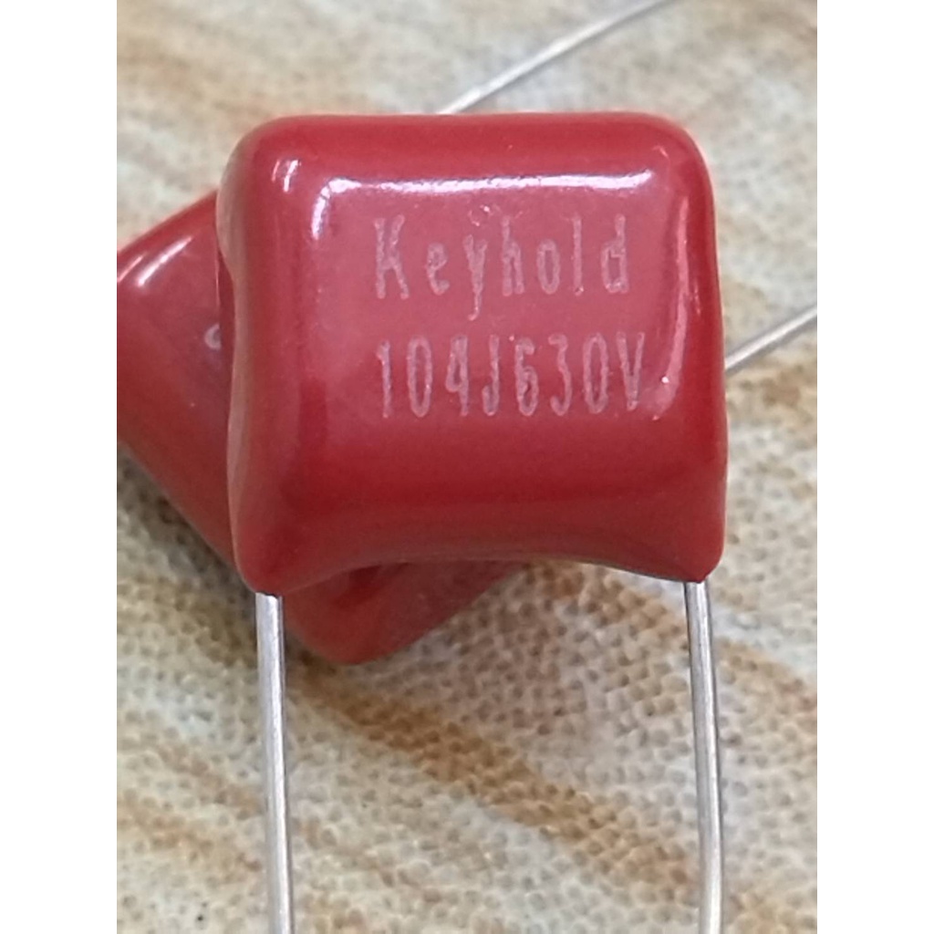 ตัวเก็บประจุ 0.1 uF  / 100nF   104J 630V 100NF 0.1UF P10mm Metallized Film Capacitor