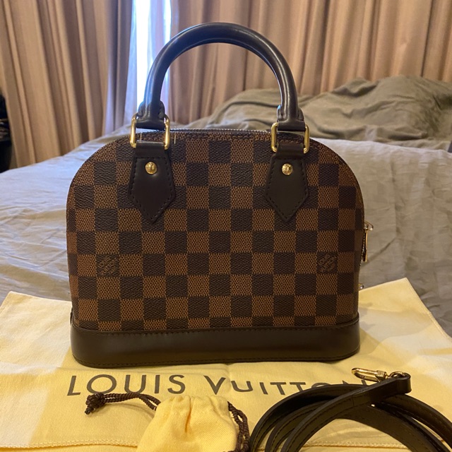 louis vuitton alma used