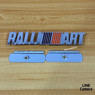 โลโก้* RALLI ART ติดหน้ากระจังรถ มิตซูบิซิ เป็นงานโลหะ ( ขนาด* 2.3 x 13 cm ) ราคาต่อชุด