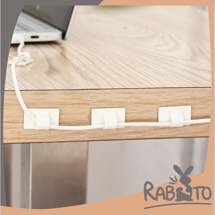 【ถูกที่สุด】RABITO KM564 ตัวเก็บสายไฟ กิีบติดสายไฟ 3M 1แพค8ชิ้น จัดระเบียบโต๊ะทำงาน ชั้นวางทีวีให้สวยงาม