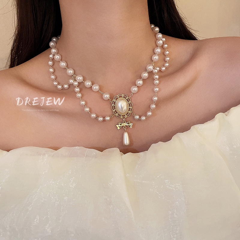 DREJEW สร้อยคอ จี้รูปหยดน้ํา ประดับโบว์ ไข่มุก หรูหรา สไตล์เกาหลี ฝรั่งเศส ระดับไฮเอนด์ สําหรับผู้หญิง