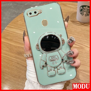 Modu เคสโทรศัพท์มือถือชุบไฟฟ้า ลายนักบินอวกาศ หรูหรา พร้อมขาตั้ง สีมาการอง สําหรับ OPPO A7 A5S A12 A11K F9 Pro