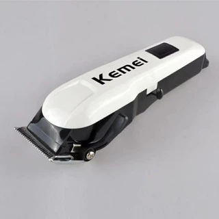 Kemei km809A ปัตตะเลี่ยนตัดผม ไร้สาย ใช้งานสะดวก แถมหวีลองที่ชาร์จในตัว ของแท้