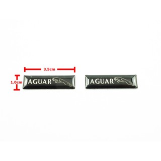 ป้ายโลโก้ เลซิ่น JAGUAR ขนาด 3.5X1.0 cm สีดำติดตั้งด้วยเทปกาวสองหน้าด้านหลัง