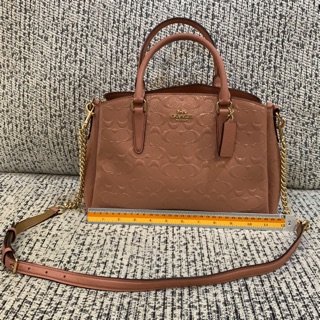 กระเป๋าสะพายข้างทรงปราด้า coachแท้ usedlikenew!!!!