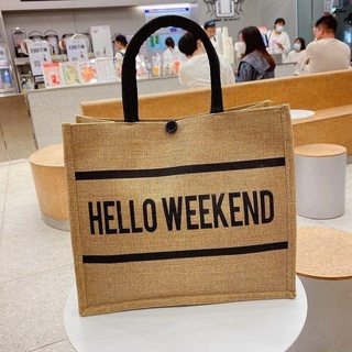 กระเป๋าผ้ากระสอบ ลาย HELLO WEEKEND มีกระดุมคาด ด้านในเคลือบกันน้ำ