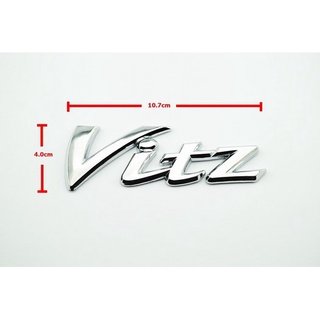 โลโก้ วิทซ์ โตโยต้า มีกาวพร้อมติดตั้ง Vitz logo sign chrome plated size 10.7x4.0 cm for Toyota Vitz (Yaris)