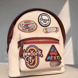 COACH  CHARTER BACKPACK 18 WITH PATCHES