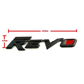 ป้ายโลโก้ TOTOTA HILUX REVO พลาสติกสีดำ ขนาด 19.8X4.6cm ติดตั้งด้วยเทปกาวสองหน้าด้านหลัง