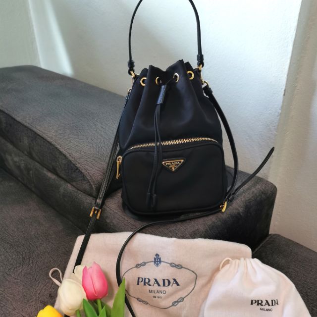 prada bucket bag used