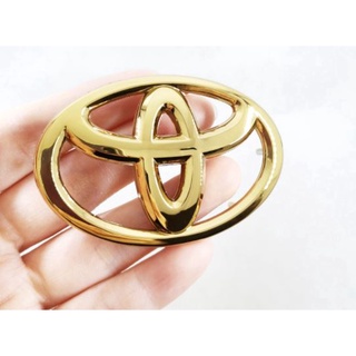 โลโก้อะไหล่เดิม ติดพวงมาลัย สีทอง มีขา โตโยต้า ขนาด 6.5 cm Toyota gold logo Steering Wheel logo  camry vios yaris